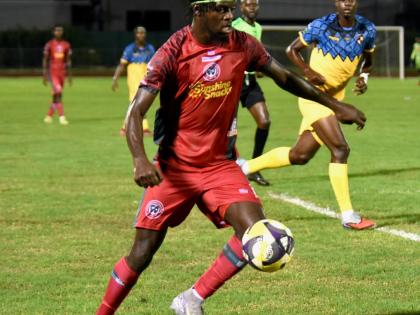 Montego Bay United’s Dwight Merrick controls a ball during the Jamaica Premier League match against Racing United at the Catherine Hall Sports Complex on October 19.