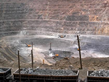 In this July 6, 2010 file photo, workers use machinery to dig at a rare earth mine in Baiyunebo mining district of Baotou in north China’s Inner Mongolia Autonomous Region.