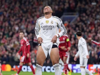 Real Madrid’s Kylian Mbappé reacts during the Champions League football match against Liverpool at Anfield yesterday.