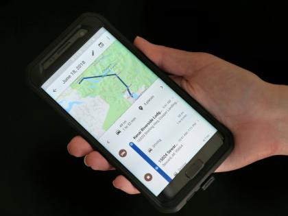 A mobile phone displays a user’s travels using Google Maps.