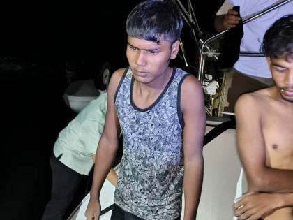 This photo released by Malaysian Maritime Enforcement Agency shows migrants handed over to authorities after they were rescued by a sailboat, in waters off northern resort island of Langkawi.