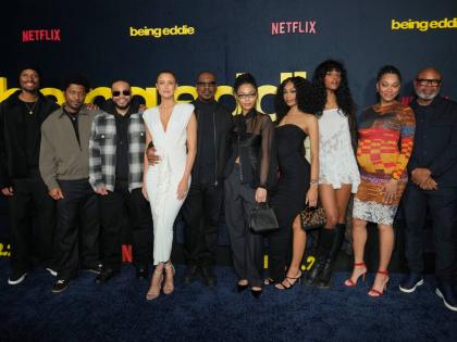 From left: Miles Mitchell Murphy, Christian Murphy, Eric Murphy, Paige Butcher, Eddie Murphy, Bella Murphy, Shayne Audra Murphy, Zola Ivy Murphy and Bria Murphy arrive at the premiere of ‘Being Eddie’ on Wednesday at Netflix Tudum Theater in Los Angele
