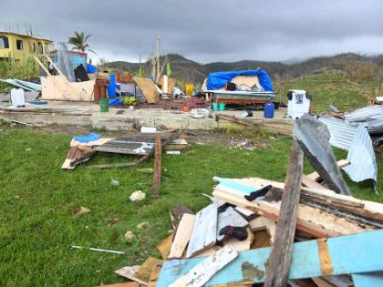 This photo shows debris strewn around the home of Crystal Morris, in New Works, Westmoreland, which was severely damaged by Hurricane Melissa.