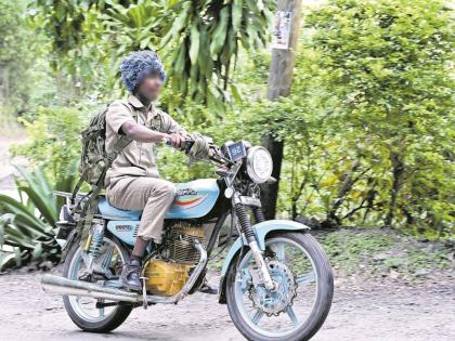 A sudent of Mavis Bank High School in St Andrew journeys home on his motorbike after school last week.
