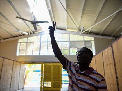 Milbert Miller, principal of the Sydney Pagan STEM Academy in St Elizabeth, shows damage done to some of the school’s facilities by Hurricane Melissa.