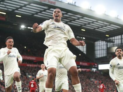 
Nottingham Forest’s Murillo (centre) celebrates after scoring his side’s opening goal during the English Premier League football match against Liverpool in Liverpool, England, yesterday.