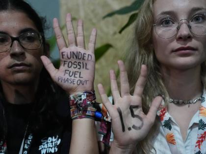 Activists participate in a demonstration outside where negotiations were taking place at the COP30 UN Climate Summit, on November 21, in Belém, Brazil.