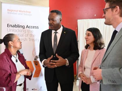 Dr Wayne Wesley (centre), CXC registrar, in conversation with Carol Simpson (left), officer-in-charge of the World Intellectual Property Organization’s (WIPO) Division for Latin America and the Caribbean; Monica Halil Lövblad (second right), head of WIP