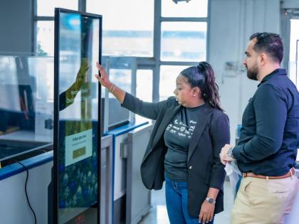 Chrysta-Jaye Walker (left), category manager, printing, consumables and HP systems at Intcomex Jamaica, leads a demonstration of available gift items for Amit Mahbubani, General Manager of ROK Hotel Kingston at Intcomex Jamaica Hurricane Melissa Relief Lau