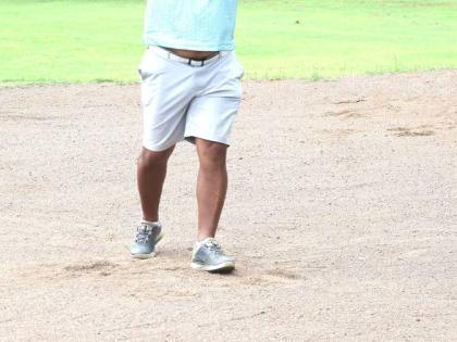 Contributed 
Paul Leyow throws his hands up in celebration after sinking a birdie to win the AMG Buccaneer Golf Tournament in dramatic fashion last Sunday at the Caymanas Golf Club in St Catherine.