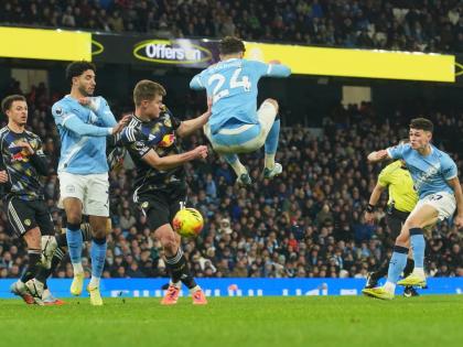 AP 
Manchester City’s Phil Foden (right) scores during the English Premier League football match against Leeds United in Manchester, England yesterday.