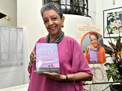 First-time author Sandra D. Cooper, at the launch of her debut book, ‘Flying Without Wings: How to Live as a Spiritual Superhero in a Human Bodysuit’, at the Temple of Light Centre for Spiritual Living on Wednesday.