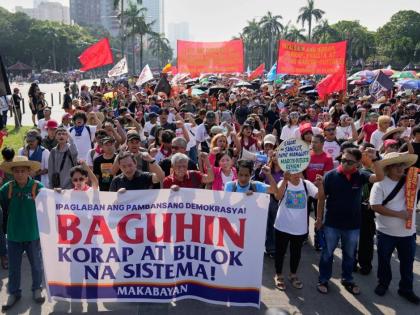 Protesters shout slogans during anti-corruption protest in Manila, Philippines on Sunday, November 30, 2025. 