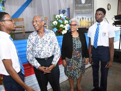 From left: Student Cameron Shepherd engages with founder of C.H.E.W. Foundation, Donovan Lewis, Margaret Campbell, principal of St George’s College, and student Nathaniel Farquharson, at the St George’s College Lecture Series held on Tuesday at the Abe
