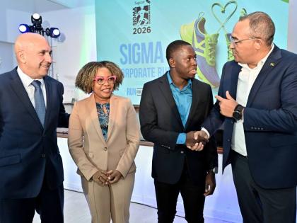 Oblique Seville (second right), Jamaica’s 100 metres world champion and one of the patrons for next year’s Sagicor ‘Run for the West’,  with (from left) Christopher Zacca, president and CEO of Sagicor Group and chairman of Sagicor Foundation; Senat