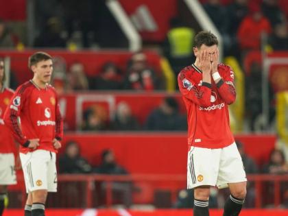 Manchester United’s Bruno Fernandes (right) reacts after West Ham’s Soungoutou Magassa scored his side’s first goal during the English Premier League  match between Manchester United and West Ham United in Manchester, England, yesterday.