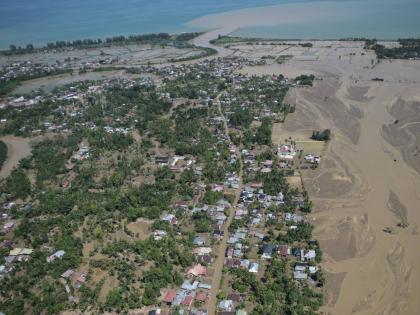 This aerial photo taken from a national disaster mitigation agency's helicopter during an aerial aid distribution shows an area affected by floods in Pidie Jaya, Aceh province, Indonesia on December 4, 2025. 