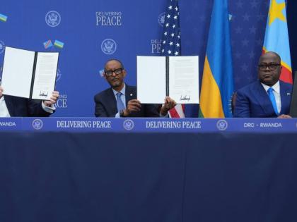United States President Donald Trump, Rwanda's President Paul Kagame and Democratic Republic of Congo President Felix-Antoine Tshisekedi, during a signing ceremony at the Donald J. Trump Institute of Peace on December 4, 2025, in Washington. 