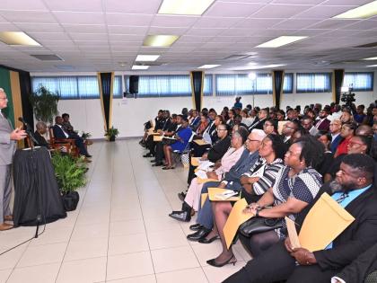 Minister of Justice and Constitutional Affairs, Delroy Chuck, addressing the commissioning ceremony for Justices of the Peace for Kingston, held on December 4, 2025, at Kingston Bookshop, downtown Kingston.