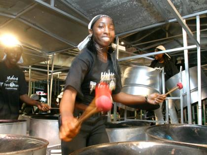 A steelpan player performs during the National Panorama 2004 band competition February 8, 2004, at the Queen’s Park in Port of Spain, Trinidad.