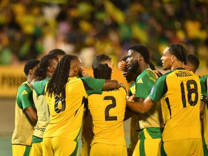 Jamaica’s Reggae Boyz celebrate after scoring against Trinidad and Tobago during a Concacaf Group B World Cup qualifier at the National Stadium in October. Jamaica won 2-0. 