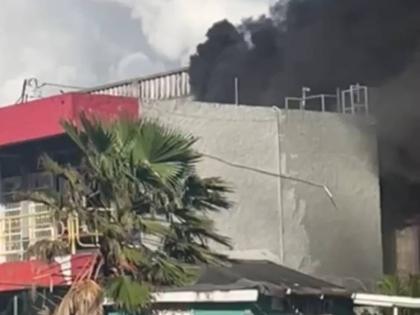 A fire on the compound of a supermarket in Negril, Westmoreland on December 9, 2025.