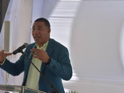 Prime Minister Dr Andrew Holness making his keynote address at the Topping Out Ceremony for Tower One at The Pinnacle Montego Bay in St James on December 10, 2025.