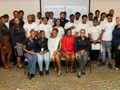 The MultiCare Youth Foundation’ Executive Director Mitzian Turner (right), administrative manager Ann Astwood (2nd right), and senior project officer Ganesh Nactie (centre back in black) led their hardworking team in celebrating their protegees’ and Pr