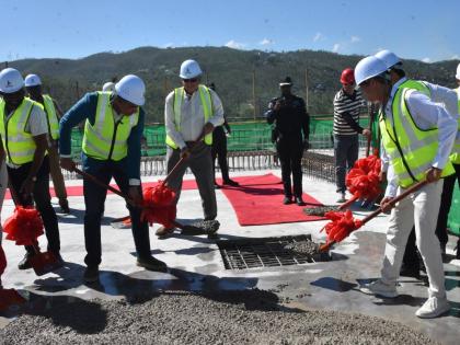 Prime Minister Dr Andrew Holness and executives of LCH Development topping out Tower One at The Pinnacle Montego Bay in St James yesterday.