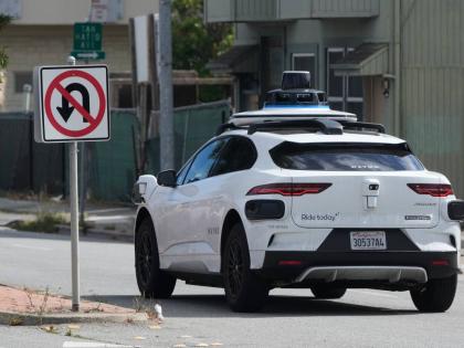 
A Waymo vehicle drives past a ‘No U-Turn’ sign in San Bruno, California, Tuesday, September 30, 2025.