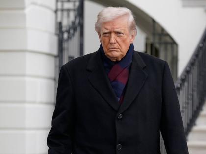 President Donald Trump talks to reporters as he departs from the South Lawn of the White House, Saturday, December13, 2025, in Washington, en route to Baltimore to attend the Army-Navy football game. (AP Photo/Jose Luis Magana)