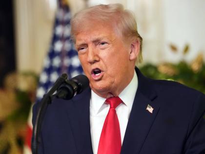 US President Donald Trump speaks during an address to the nation.