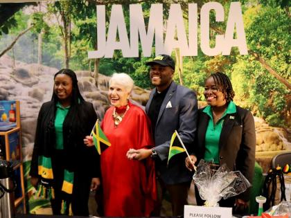 Organiser of Winternational international embassy showcase, Jan Du Plain (second from left), shares a photo opportunity at Jamaica’s booth with (from left) Counsellor Brittany McCera, Community Relations Officer Emile Wallace Waddell, and Minister Counse