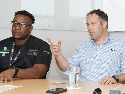 
Yoni Epstein (right), Chairman, Montego Bay United Football United (MBUFC) speaking while Dr Germaine Spencer, President of MBUFC looks on during a press conference.