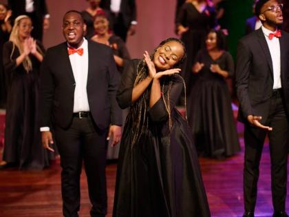 Sherona Forrester-Thomas (centre), founding member, along with tenors Anthony Morgan (left) and Kyle Harvey, engage the audience during the performance of 'A Dexter Christmas' at last year's concert. 