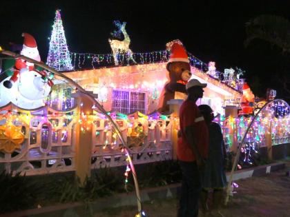 This file photo shows a house in Fairbanks Drive in Mandeville, Manchester, decorated with Christmas lights.