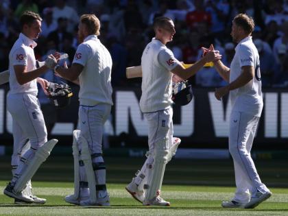 
England’s Jamie Smith (left) Ben Stokes (second left) Harry Brook, and Joe Root (right) shake hands after defeating Australia on day two of their Ashes cricket Test match in Melbourne yesterday.