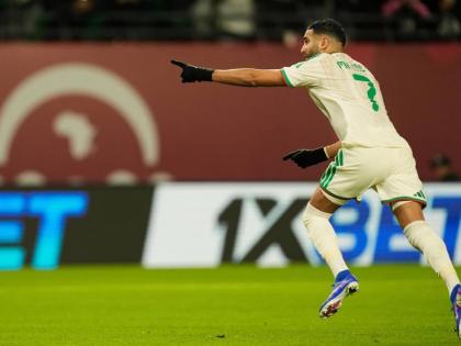 Algeria’s Riyad Karim Mahrez celebrates after scoring his side’s first goal during the Africa Cup of Nations Group E match against Burkina Faso in Fez, Morocco, yesterday.