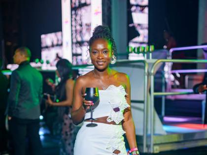 Above: Laurice Griffiths, junior brand manager at Red Stripe, raises her drink to a good time.