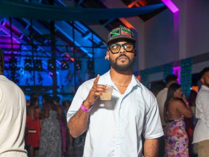 Photographer Russell Hamilton steps in front of the lens, keeping it cool and casual. 