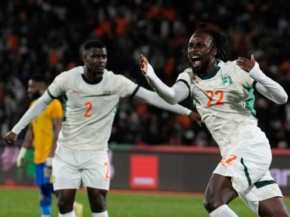 Ivory Coast’s Evann Guessand (right) celebrates after scoring during the Africa Cup of Nations Group F football match against Gabon in Marrakech, Morocco yesterday. Looking on is Ivory Coast’s Ousmane Diomande.