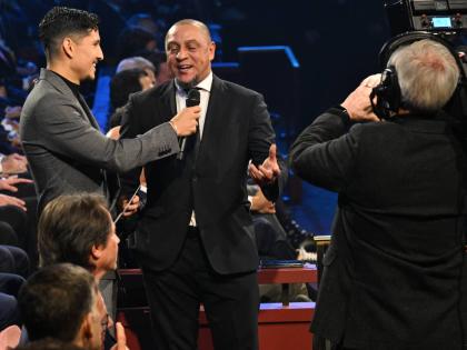 Former Brazil star Roberto Carlos is interviewed by actor Danny Ramirez during the draw for the 2026 FIFA World Cup at the Kennedy Center in Washington on Friday, December 5. 