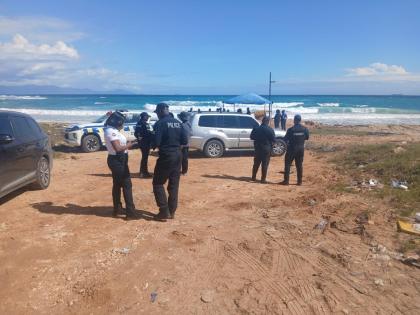 
Members of the Marine Police and the Jamaica Defence Force searching for Constable Shamar Grant and 13-year-old Arron Russell, who were swept away by strong currents in Hellshire, St Catherine, on New Year’s Day.