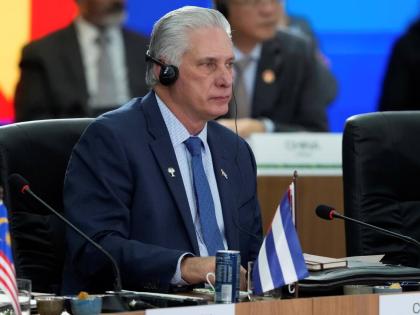 Cuba's President Miguel Diaz-Canel attends the 17th annual BRICS summit in Rio de Janeiro, Sunday, July 6, 2025. (AP Photo/Eraldo Peres)