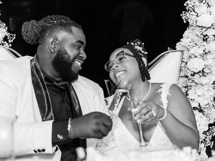 The Henrys raise a glass, making a toast to happily ever after.