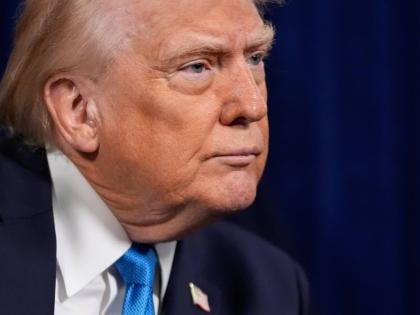 US President Donald Trump listens to a question during a news conference at Mar-a-Lago on January 3, 2026, in Palm Beach, Florida.