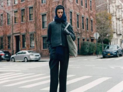 Lensed on the streets of Lower Manhattan last month, SAINT’s Dixon rocks the Colorado jacket, pleated trousers and a cashmere scarf from Daniel Simmons’ Winter collection. 