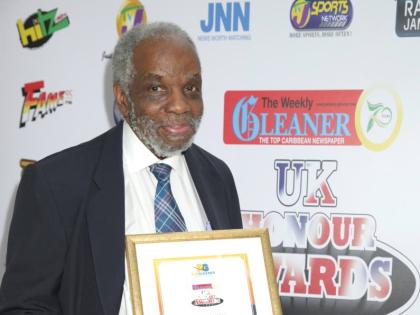 Dr Aggrey Burke proudly holds the Weekly Gleaner Honour Award Certificate which was presented to him in October 2023. 