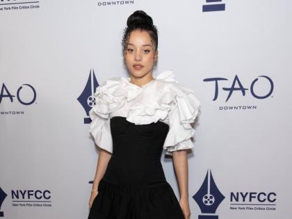 Chase Infiniti attends the New York Film Critics Circle Awards wearing Carolina Herrera and Gianvito Rossi. 