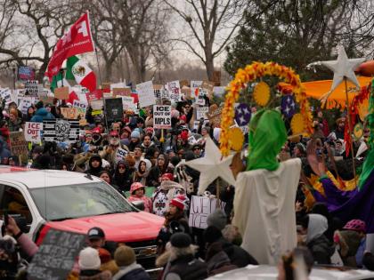 Protesters gather during a rally for Renee Good, who was fatally shot by an ICE officer in Minneapolis. 
